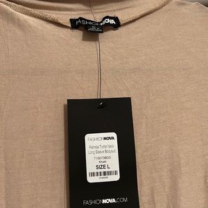 Brand new khaki colored turtle neck bodysuit
